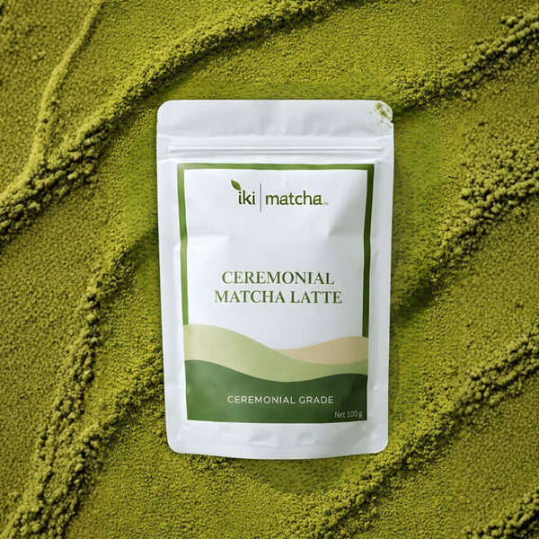 Packaging of iki matcha ceremonial matcha latte on a bed of green matcha powder.