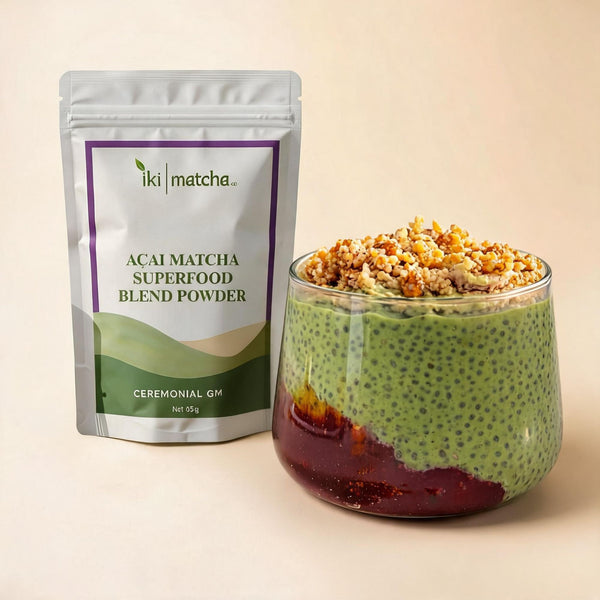 Bowl of acai matcha smoothie with superfood blend powder packaging on a beige background